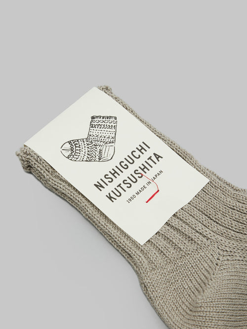 nishiguchi kutsushita linen ribbed socks beige front label